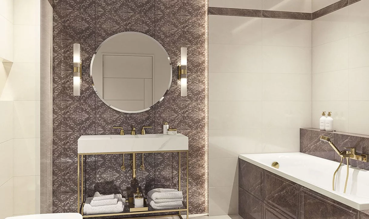 Nowoczesna łazienka z dużymi beżowymi płytkami i dekoracyjną ścianą z kamieniopodobnych płytek.