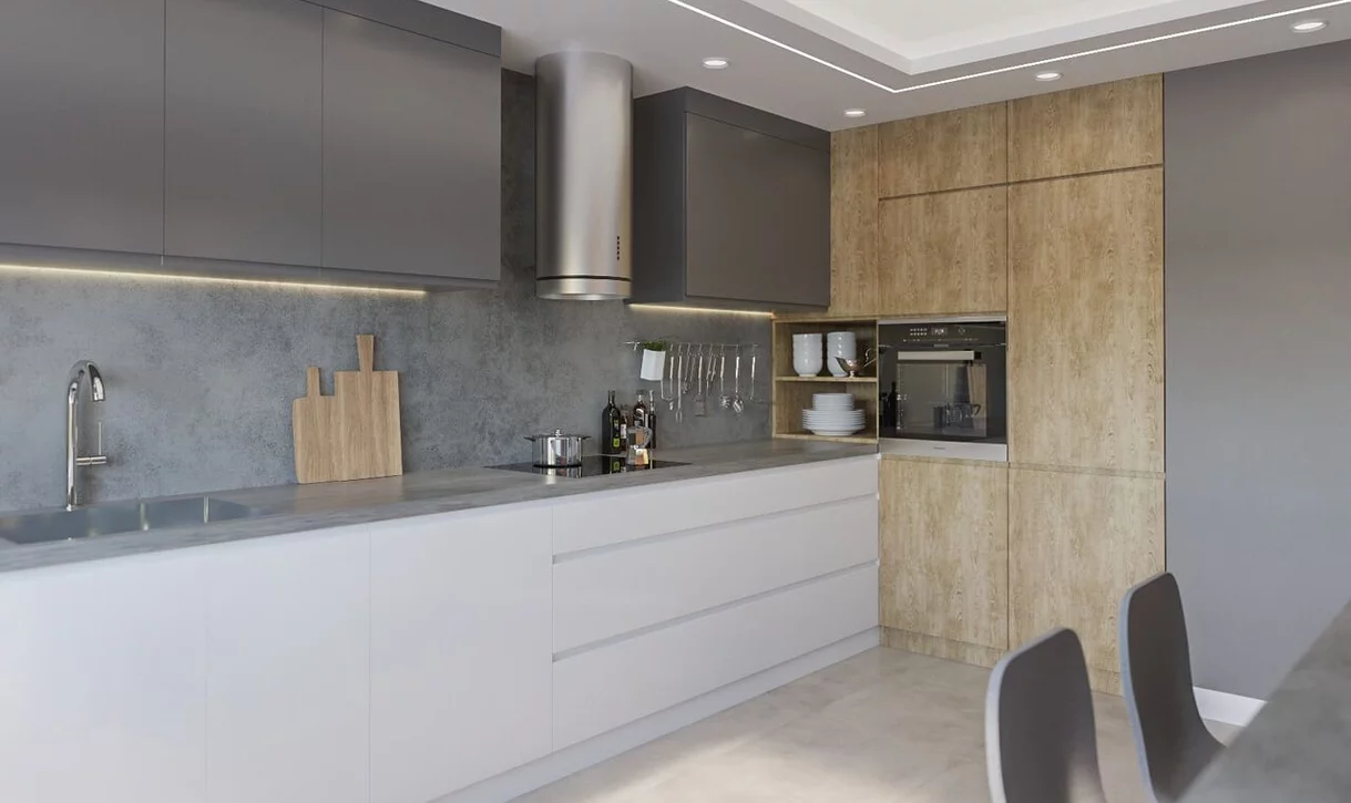 Nowoczesna kuchnia z płytkami imitującymi beton na ścianie nad blatem i drewnopodobnymi szafkami.