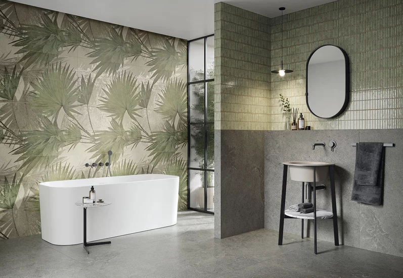 Nowoczesna łazienka z zielonymi płytkami ściennymi z kolekcji Green Philosophy oraz szarymi płytkami imitującymi beton.