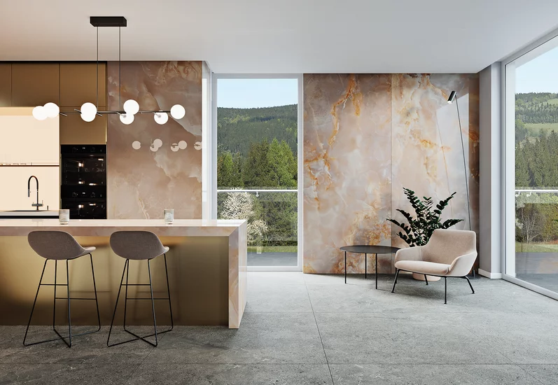Nowoczesna kuchnia i salon z marmurowymi płytkami inspirowanymi kamieniem z kolekcji Invisible i szarą podłogą imitującą beton.