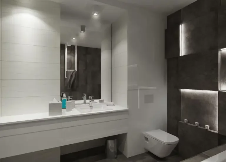 Nowoczesna łazienka z białymi płytkami ceramicznymi i matowymi płytkami imitującymi beton z oświetleniem LED.